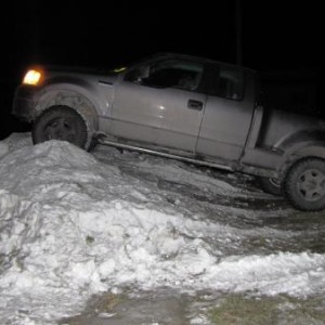 Playing in the snow pile across the street...